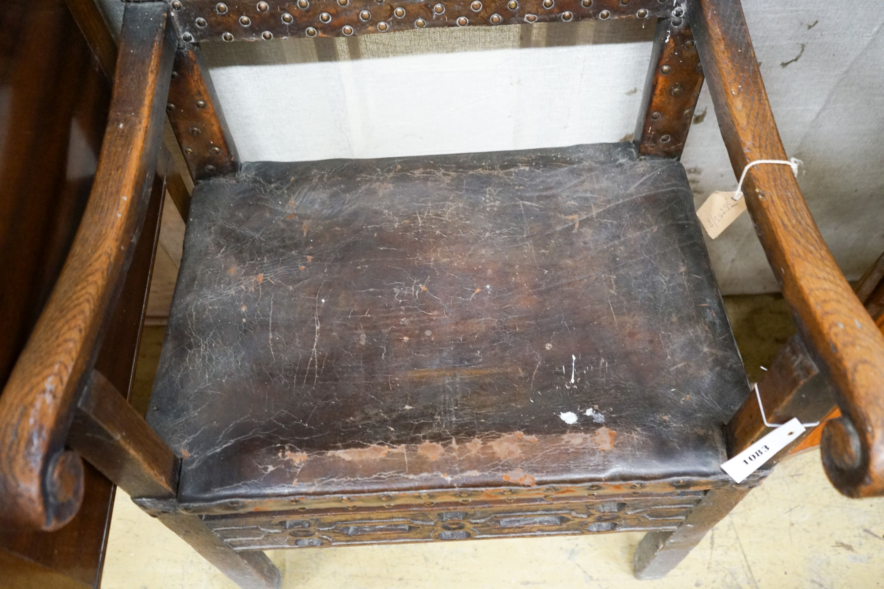 An 18th century oak elbow chair, width 59cm, depth 54cm, height 96cm